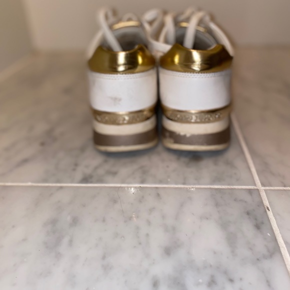 Micheal Kors gold and white sneakers - Picture 3 of 3